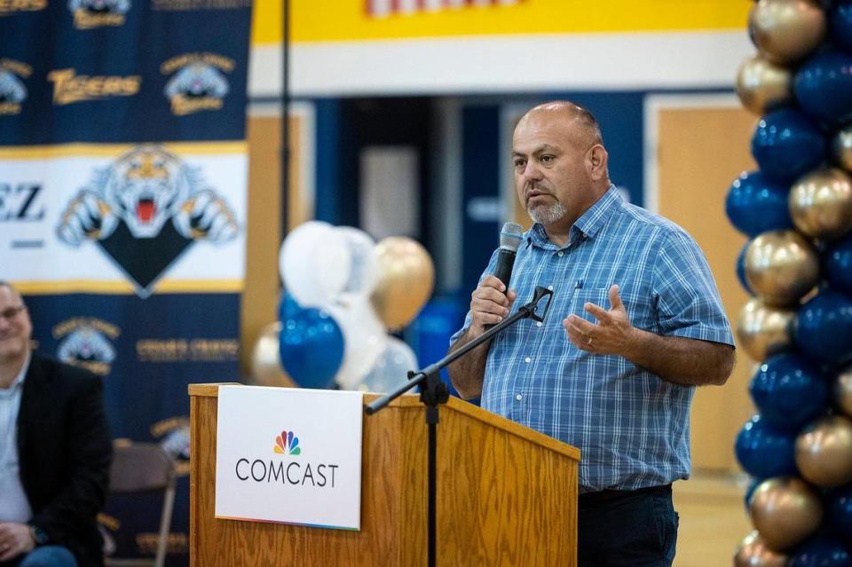 Merced County District 1 Supervisor Rodrigo Espinosa, speaks to eighth-graders during a ceremony announcing a $4.5 million investment by Comcast to bring high-speed internet and broadband services to the area, at Cesar E. Chavez Middle School in Planada, Calif., on Monday, April 17, 2023. According to Nathan Ahle, Comcast Director of Government Affairs for the South Valley, the $4.5 million investment involves extending the existing network from nearby Merced into the town of Planada.