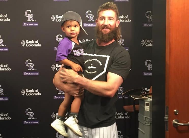 Rockies All-Star Charlie Blackmon hangs out with his two-year-old superfan Tommy Carlson. (Rockies)