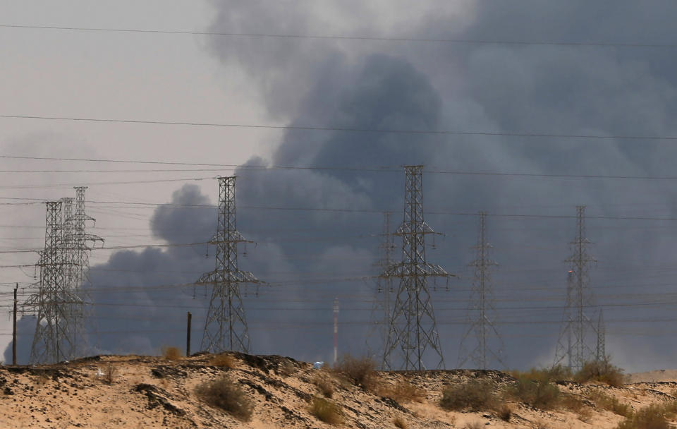 Smoke billows after a fire at an Aramco factory in Abqaiq, Saudi Arabia on September 14. Courtesy: REUTERS/Stringer