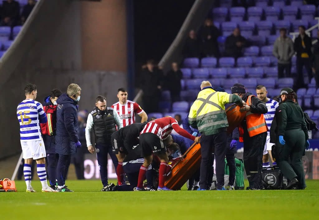 Sheffield United’s John Fleck was taken from the pitch on a stretcher (PA Wire)