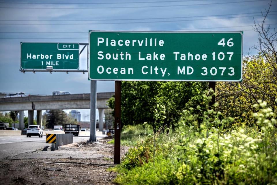 A highway sign at the West Coast starting point of Highway 50, in West Sacramento, indicates that the route’s eastern terminus is 3,073 miles away in Ocean City, Md. Photographed on April 21, 2023