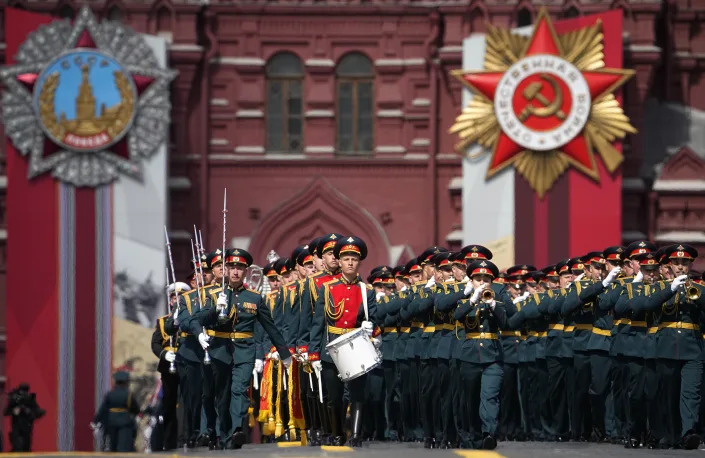 Russian Army orchestra march after the Victory Day military parade in Moscow, Russia, Monday, May 9, 2022, marking the 77th anniversary of the end of World War II. (AP Photo/Alexander Zemlianichenko)