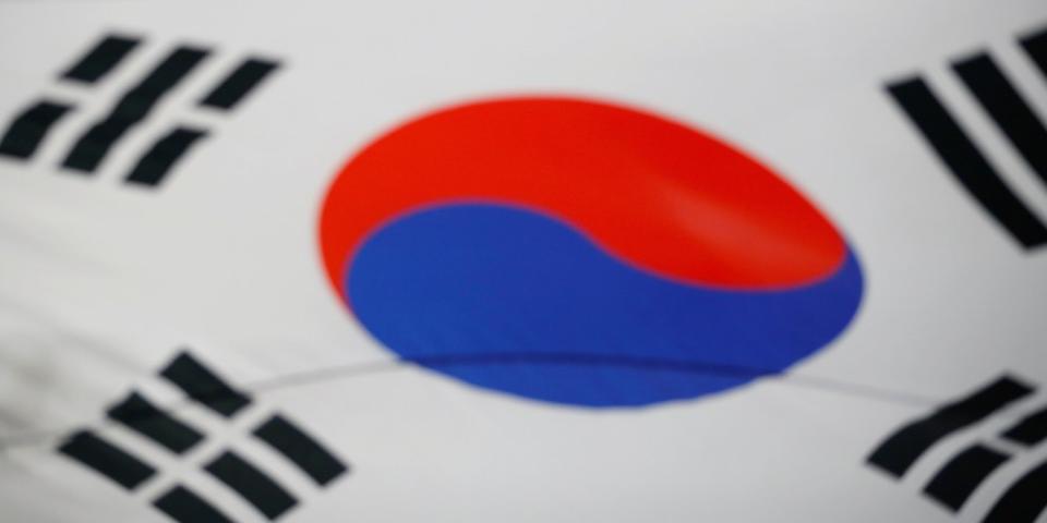 Soccer Football - International Friendly - South Korea v Colombia - Suwon World Cup Stadium, Suwon, South Korea - November 10, 2017 - South Korea's national soccer team members stand behind the national flag.