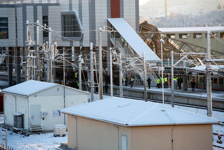 Rescue workers and firemen are seen at the scene of a high speed train crash in Ankara, Turkey December 13, 2018. REUTERS/Tumay Berkin