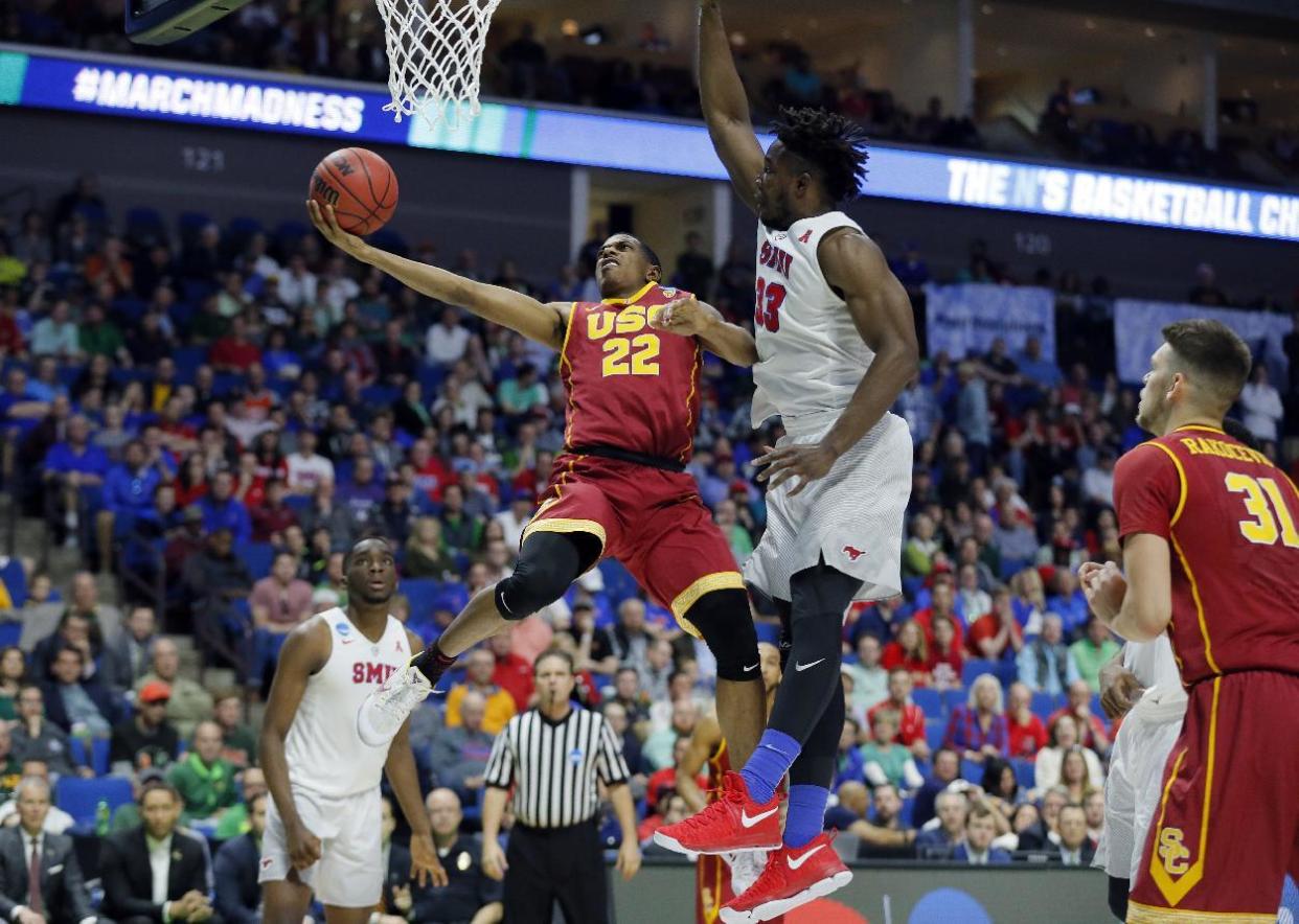 USC’s De’Anthony Melton goes up for a shot in front of SMU’s Semi Ojeleye during the NCAA tournament last March. (AP)