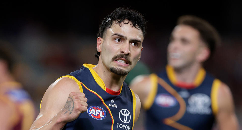 Sen here, Izak Rankine celebrating a goal during Adelaide's match against Brisbane in the AFL. 