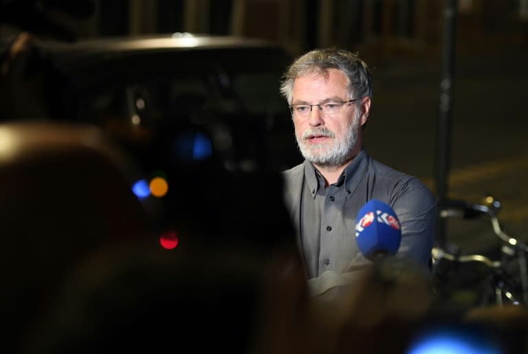 Spokesman for the Federal Prosecutor Eric Van Der Sypt addresses media representatives on a street outside Gare Centrale in Brussels on June 20, 2017