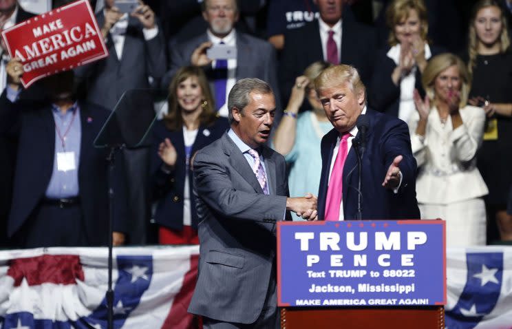 Donald Trump welcomes Nigel Farage, ex-leader of the U.K. Independence Party, at a campaign rally in Jackson, Miss. (Photo: Gerald Herbert/AP)