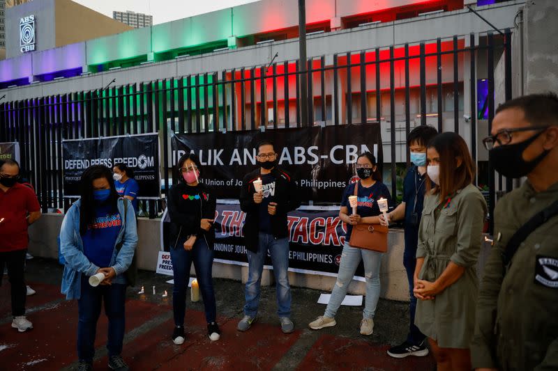 FILE PHOTO: ABS-CBN broadcast network employees gather as Philippine congress finalizes decision on franchise renewal