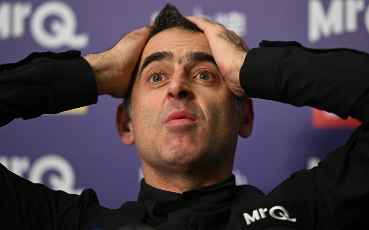 England's Ronnie O'Sullivan attends a press conference after his victory over China's Ding Junhui in the final of the 2023 MrQ UK Championship at the York Barbican in York in Northern England on December 3, 2023. England's Ronnie O'Sullivan beat China's Ding Junhui 10-7 in the final.