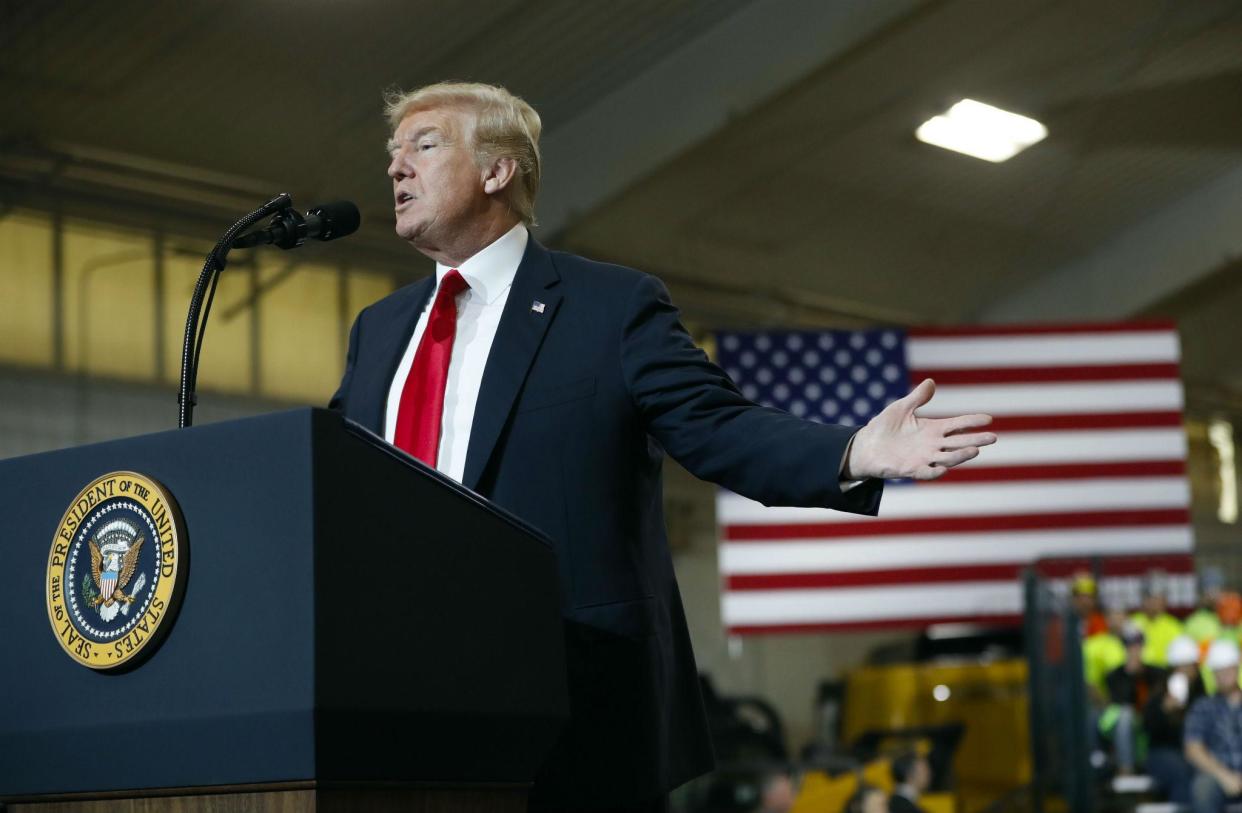 Mr Trump delivering his speech in Ohio: AP