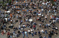 <p>Visitors on deck chairs watch tennis matches on giant screens during the French Open tennis tournament at the Roland Garros stadium, Friday, May 27, 2016, in Paris. (AP Photo/Michel Euler) </p>