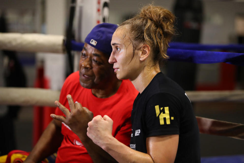 Ivana Habazin of Croatia talks to the media with her trainer Bashir Ali during a pre fight workout at Downtown Boxing Gym on October 02, 2019 in Detroit, Michigan. (Photo by Gregory Shamus/Getty Images)