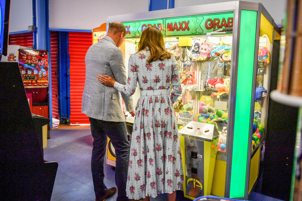 The Duke and Duchess of Cambridge play a grab a teddy game at Island Leisure Amusement Arcade, where Gavin and Stacey was filmed, during their visit to Barry Island, South Wales, to speak to local business owners about the impact of COVID-19 on the tourism sector.