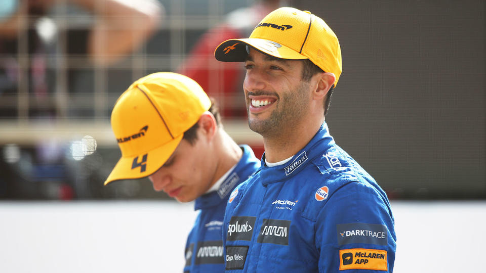 Seen here, McLaren's Daniel Ricciardo stands next to teammate Lando Norris.