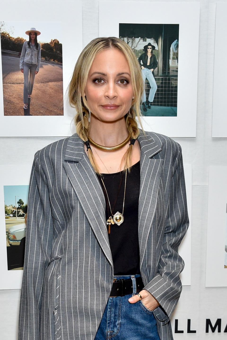 Nicole Richie with her hair in short braids.