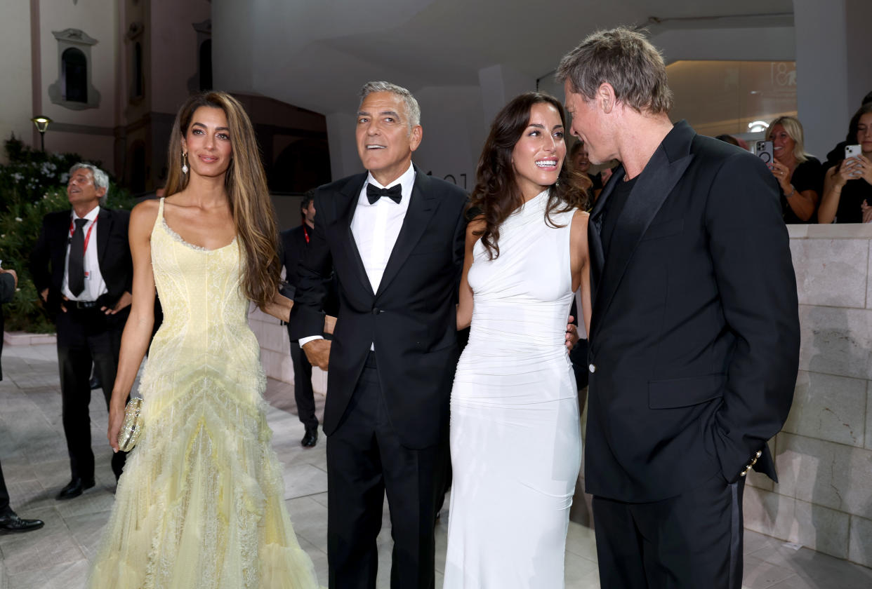 Amal Clooney, George Clooney, Ines de Ramon and Brad Pitt attend the 