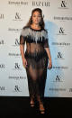 <p>Ashley Graham donned a sheer Marina Rinaldi dress to the <em>Harper’s</em> <em>Bazaar</em> Women of the Year Awards.<br><br>The model finished the heavily embroidered gown with nineties-inspired earrings and black platform heels. <em>[Photo: Getty]</em> </p>