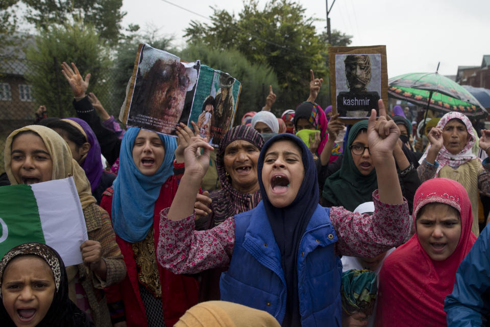 Kashmiris shout slogans during a protest after Friday prayers against the abrogation of article 370, on the outskirts of Srinagar, Indian controlled Kashmir, Friday, Oct. 4, 2019. For the last two months, mobile phone and internet services have been shut down in Indian-controlled Kashmir after New Delhi stripped the region of its semi-autonomous powers and implemented a strict clampdown. It has sent tens of thousands of extra troops to the region and detained thousands of people. (AP Photo/ Dar Yasin)