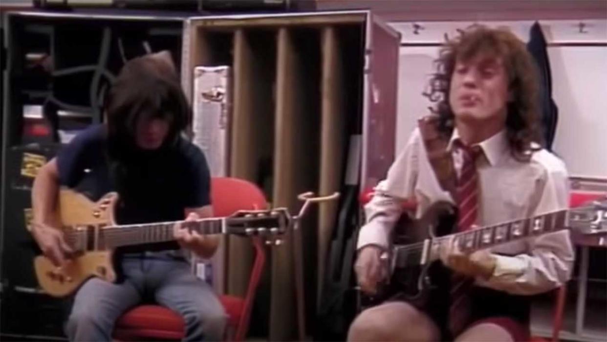  Angus Young and Malcom Young backstage 