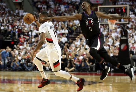 Los Angeles Clippers forward Jeff Green (8) defends Portland Trail Blazers forward Maurice Harkless (4) in the second half in game four of the first round of the NBA Playoffs at Moda Center at the Rose Quarter. Mandatory Credit: Jaime Valdez-USA TODAY Sports
