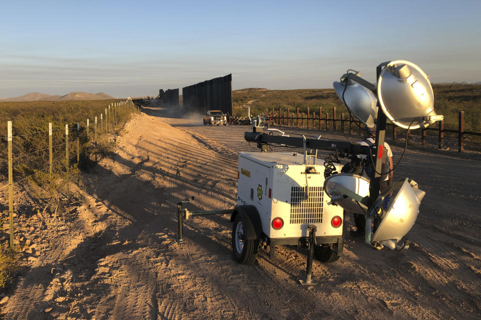 This January 2020 photo provided by the Center for Biological Diversity shows construction on a new border wall in the wetlands at the San Bernardino National Wildlife Refuge in southeastern Arizona. The federal agency in charge of the refuge warned for several months that pumping water to build a border wall would decimate the habitat, and correspondence obtained by two environmental groups shows that U.S. Customs and Border Protection ignored most of those warnings and pulled water from wells so close to the refuge that some of its ponds went dry. (Laiken Jordahl/Center for Biological Diversity via AP)