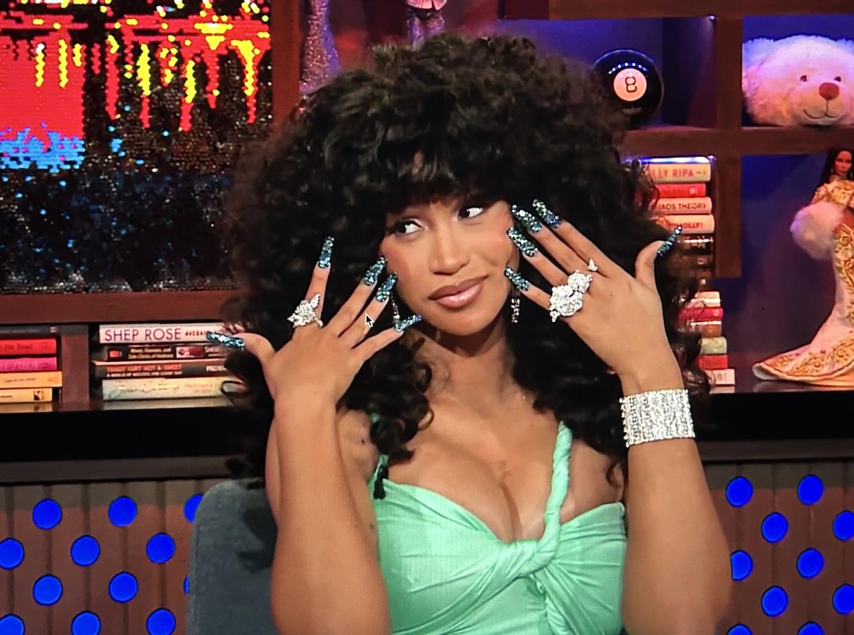 Cardi B displays her mani on Watch What Happen's Live with Andy Cohen. (Bravo)