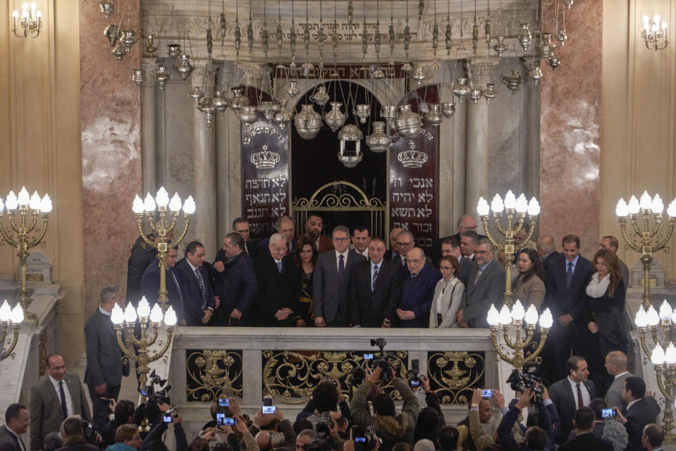 People attend the opening of Eliyahu Hanavi synagogue in Alexandria, Egypt, Friday, Jan. 10, 2020, three years after the Egyptian government started the renovations of the synagogue originally built in 1354. (AP Photo/Hamada Elrasam)