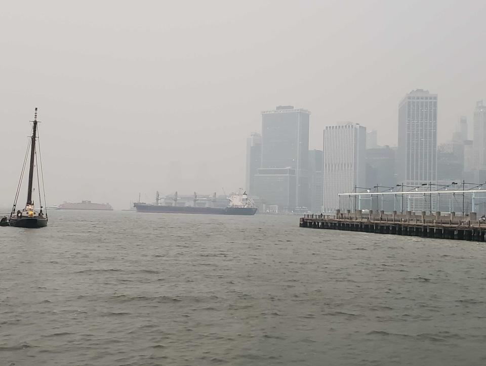 a smoky view of New York Harbor