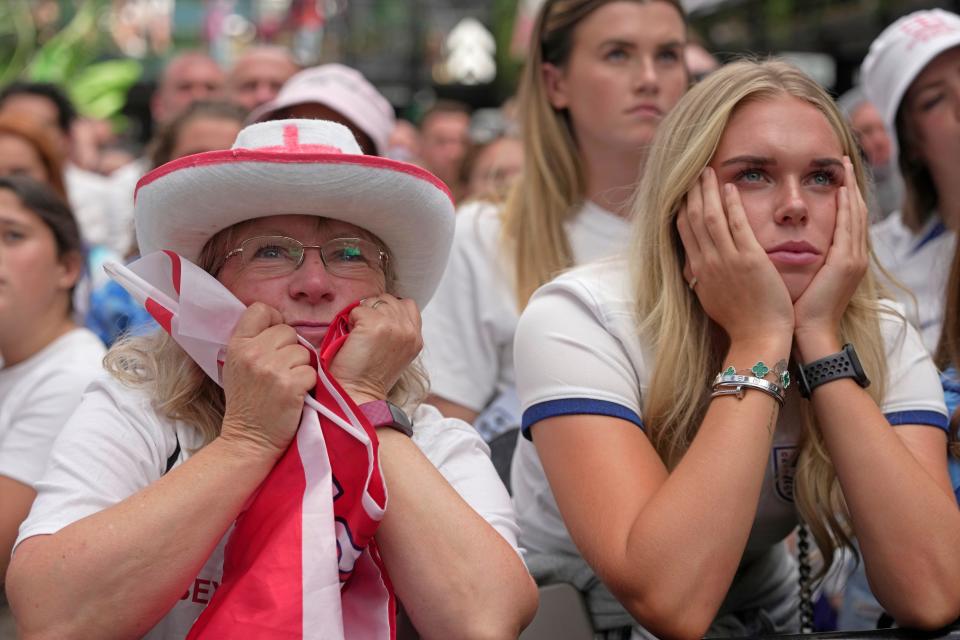 Final hurdle: England fans show their disappointment as World Cup glory slips away. (PA)