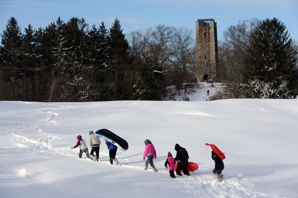 A long walk to sled at D.W. Field Park's tower hill in Brockton after a blizzard on Wednesday, Jan. 28, 2015.
(Photo: Marc Vasconcellos/The Enterprise)