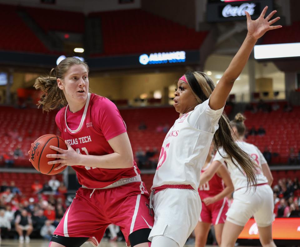 Texas Tech's Katie Ferrell (41) looks for an open pass against Kansas in a Big 12 women’s basketball game, Saturday, Feb. 11, 2023, at United Supermarkets Arena.