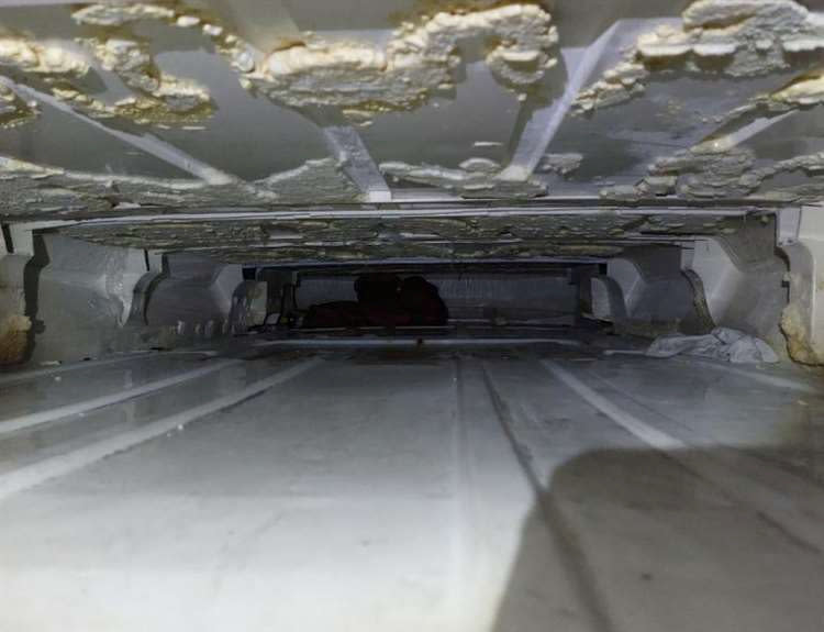 The coffin-like hide in the roof of the van where migrants were smuggled into Dover. (SWNS)