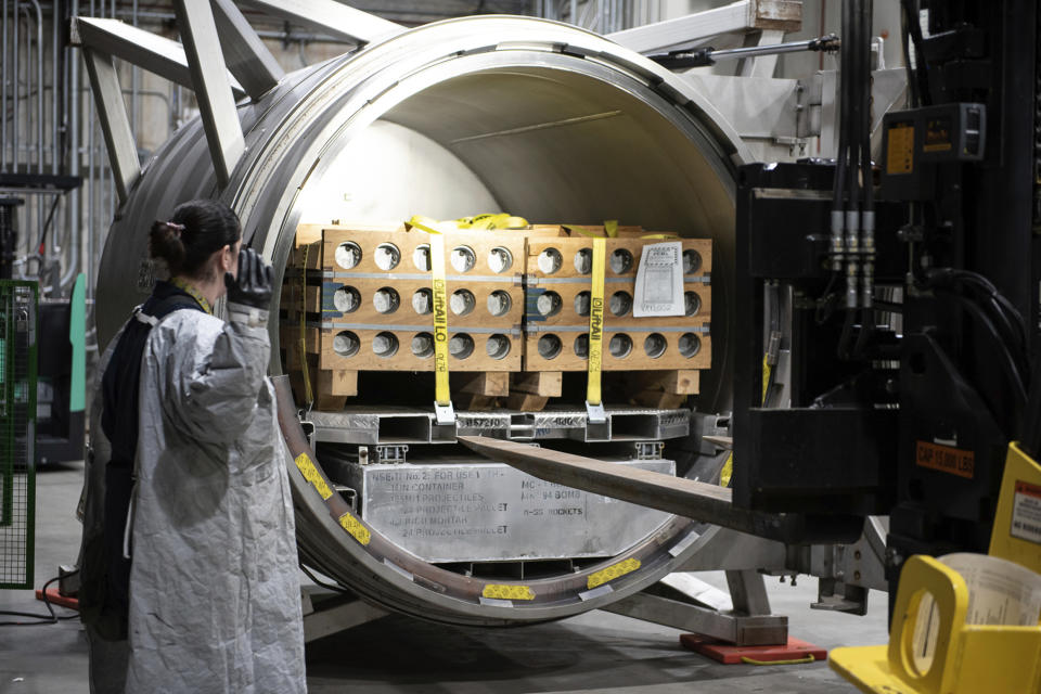 In this image released by the U.S. Army, an operator guides a forklift driver to unload VX nerve agent M55 rockets on April 15, 2022, at the Blue Grass Army Depot near Richmond, Ky. The United States has destroyed the last of its declared chemical weapons stockpile, a milestone in the history of warfare dating back to World War I. Senate Republican leader Mitch McConnell on Friday, July 7, 2023, said workers at the Blue Grass Army Depot in Kentucky eliminated the last of thousands of rockets filled with sarin nerve gas that have been stored there since the 1940s. (U.S. Army via AP)