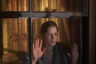 This image released by Netflix shows Amy Adams in a scene from "The Woman in the Window." (Melinda Sue Gordon/Netflix via AP)