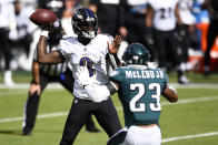 Baltimore Ravens' Lamar Jackson (8) tries to pass against Philadelphia Eagles' Rodney McLeod (23) during the first half of an NFL football game, Sunday, Oct. 18, 2020, in Philadelphia. (AP Photo/Derik Hamilton)