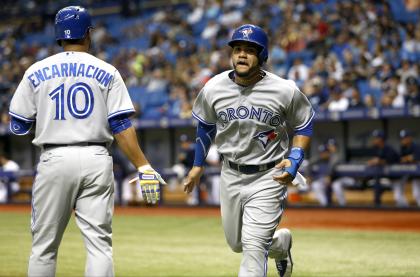 The Blue Jays have a gem in big-hitting second baseman Devon Travis (R). (Getty)