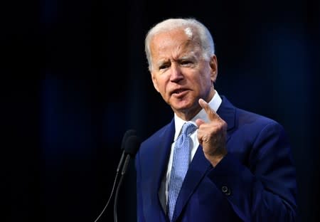 FILE PHOTO: Democratic 2020 U.S. presidential candidate and former U.S. Vice President Joe Biden addresses the crowd at the New Hampshire Democratic Party state convention in Manchester