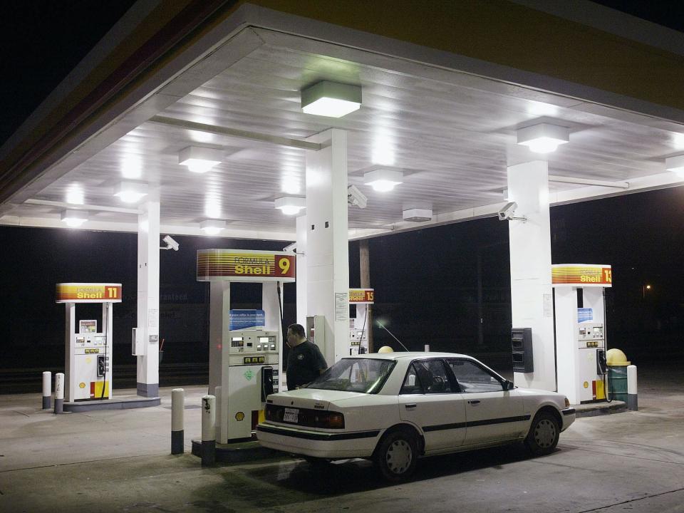 A customer at a gas station in Dunbar, W.Va. in 2003. 