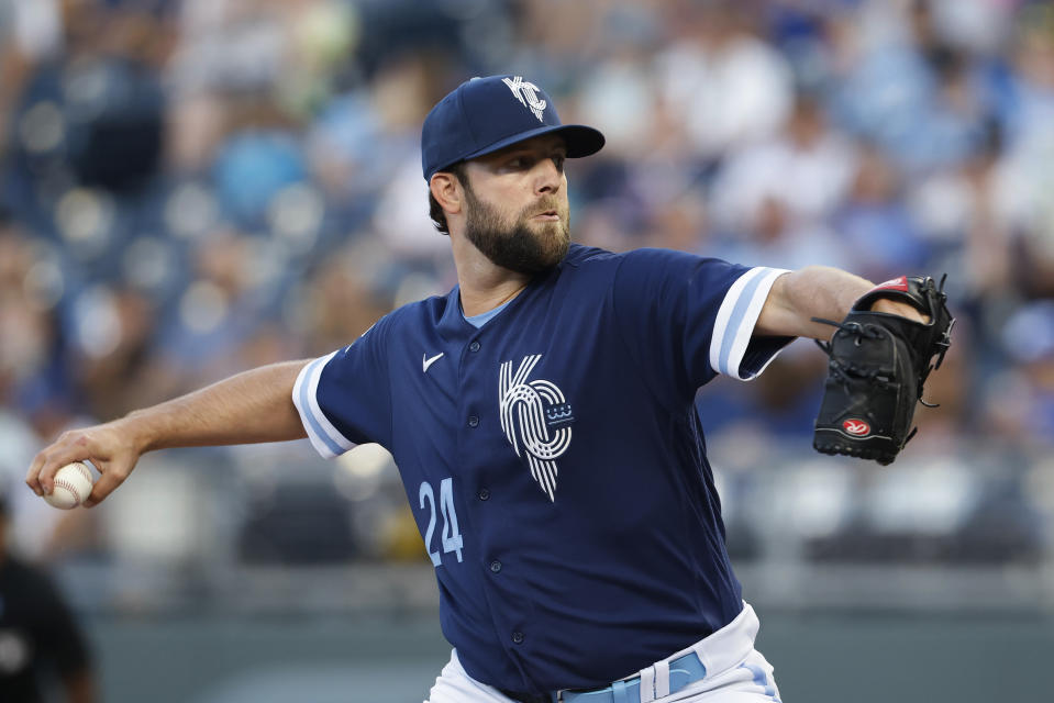 Kansas City Royals pitcher Jordan Lyles delivers to a Boston Red Sox batter during the first inning of a baseball game in Kansas City, Mo., Friday, Sept. 1, 2023. (AP Photo/Colin E. Braley)