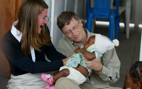 Bill and Melinda Gates during a visit to Mozambique in 2003 - Credit: Reuters