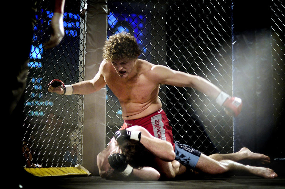 FILE - In this Feb. 7, 2009, file photo, Ben Askren pummels Josh Flowers during Askren's first MMA fight, in Columbia, Mo. Askren is finally making his UFC debut after a decade in mixed martial arts and a lifetime of wrestling. (Parker Eshelman/Columbia Daily Tribune via AP, File)