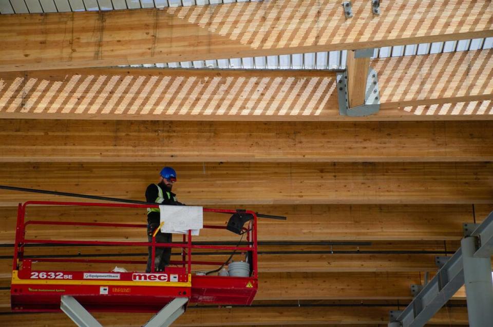 Wooden beams line the ceiling of the new Sageview High School, located at 6091 Burns Road in Pasco, Washington. Fowler General Construction will near the 50% complete mark this summer.