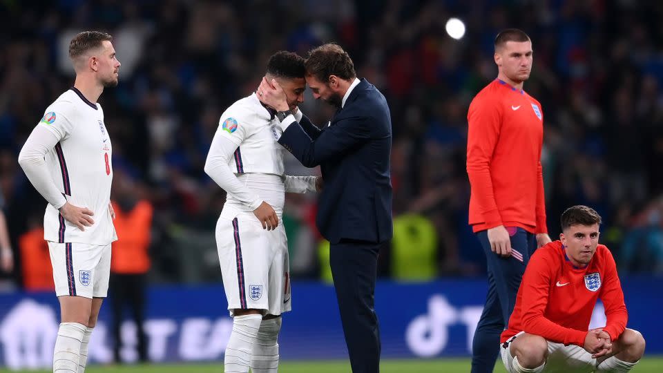 Southgate consoles Jadon Sancho after the Euro 2020 final. - Laurence Griffiths/Getty Images