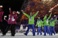 Members of the Iranian team enter the stadium during the opening ceremony of the 2014 Winter Olympics in Sochi, Russia, Friday, Feb. 7, 2014. (AP Photo/Patrick Semansky)