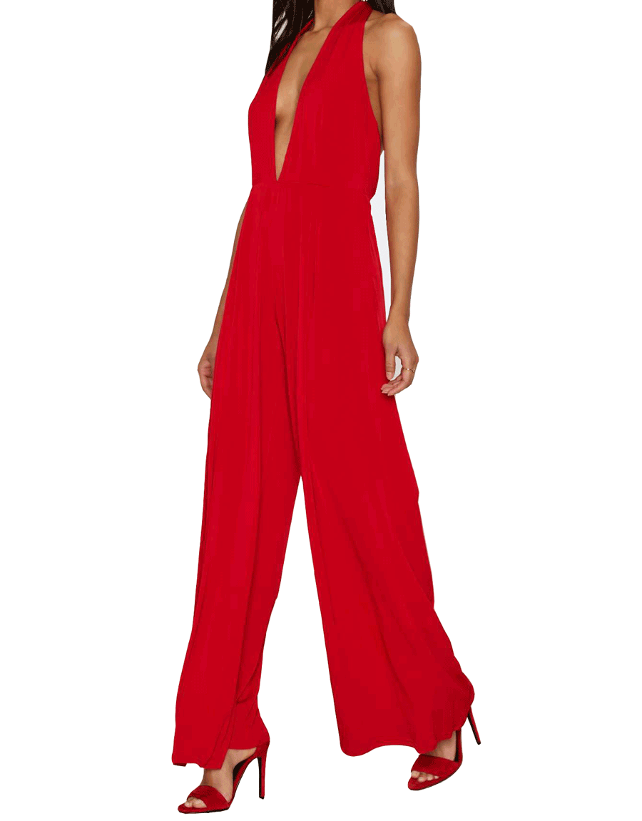 Nothing says party like a cherry-red jumpsuit — the deep V-neck is very Bianca Jagger. 