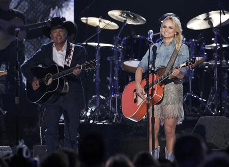 Musicians George Strait and Miranda Lambert perform a tribute to Merle Haggard at the 49th Annual Academy of Country Music Awards in Las Vegas, Nevada April 6, 2014. REUTERS/Robert Galbraith