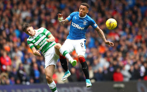 Kieran Tierney of Celtic and James Tavernier of Rangers battle for the ball - Credit: getty images