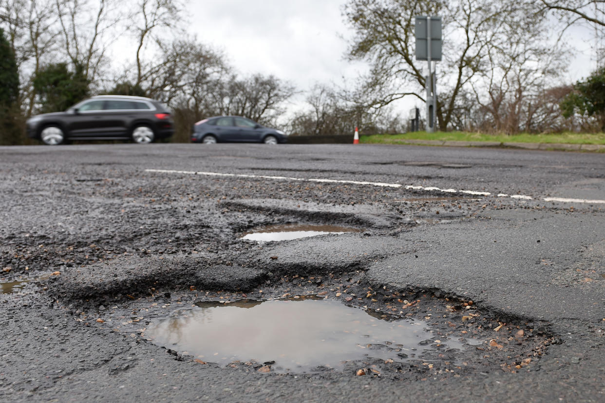 Britain is plagued by potholes after the winter (Picture: PA)