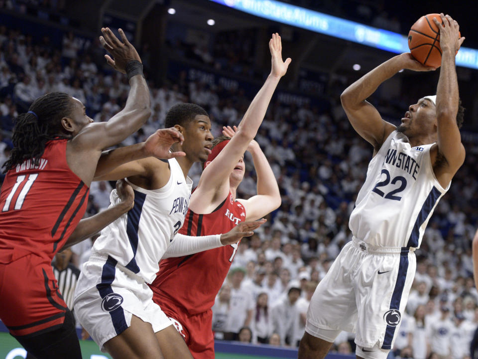 Penn State's Jalen Pickett (22) pulls up to score against Rutgers during the first half of an NCAA college basketball game, Sunday, Feb. 26, 2023, in State College, Pa. (AP Photo/Gary M. Baranec)